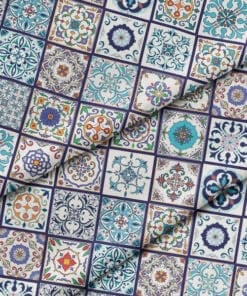 Grid of decorative ceramic tiles with various ornate patterns in blue, green, red, and cream colors