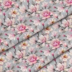 Floral fabric pattern with pink roses and peach flowers on gray background