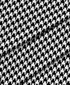 Black and white houndstooth pattern with repeating geometric checks